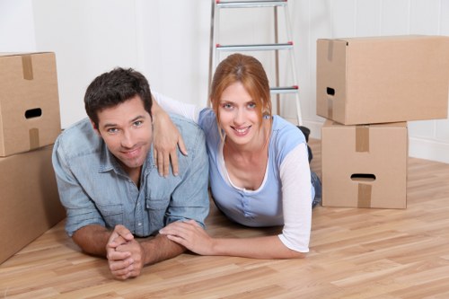 Delivery driver confirming a van move arrangement