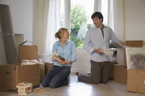 Packed moving boxes and furniture ready for a Blackfriars home or office move
