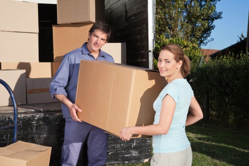 Packed household furniture ready for careful loading by local removalists